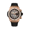 Close-up of a luxurious rose gold Hublot watch with diamond bezel and black rubber strap.